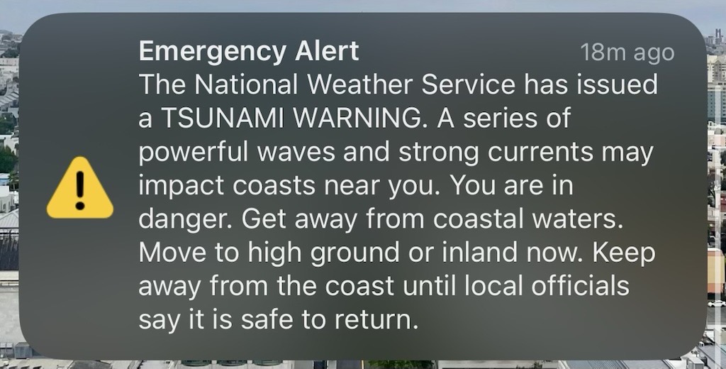 National Weather Service graphic issuing a Tsunami Warning and advising people to move to high ground