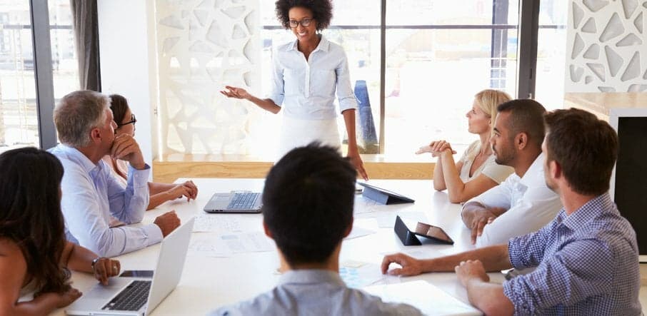 Professionals engaged in a productive meeting environment