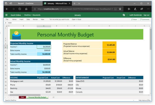 A person typing on a laptop with a Google Sheets budget template visible on the screen