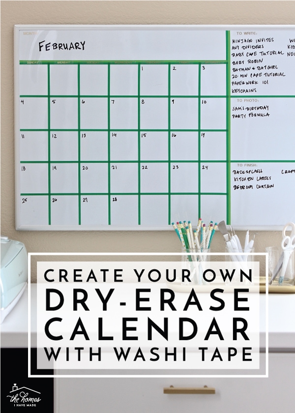 Applying washi tape to a whiteboard to create a permanent calendar grid
